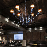Vintage Black Bare Bulb Chandelier - Metallic Multi-Head Pendant Light for Dining Room - This is a bare bulb chandelier that would be perfect for a rustic or industrial-themed dining room. It is made of metal and has a black finish. There